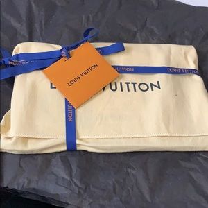 LV Ebene pochette sold